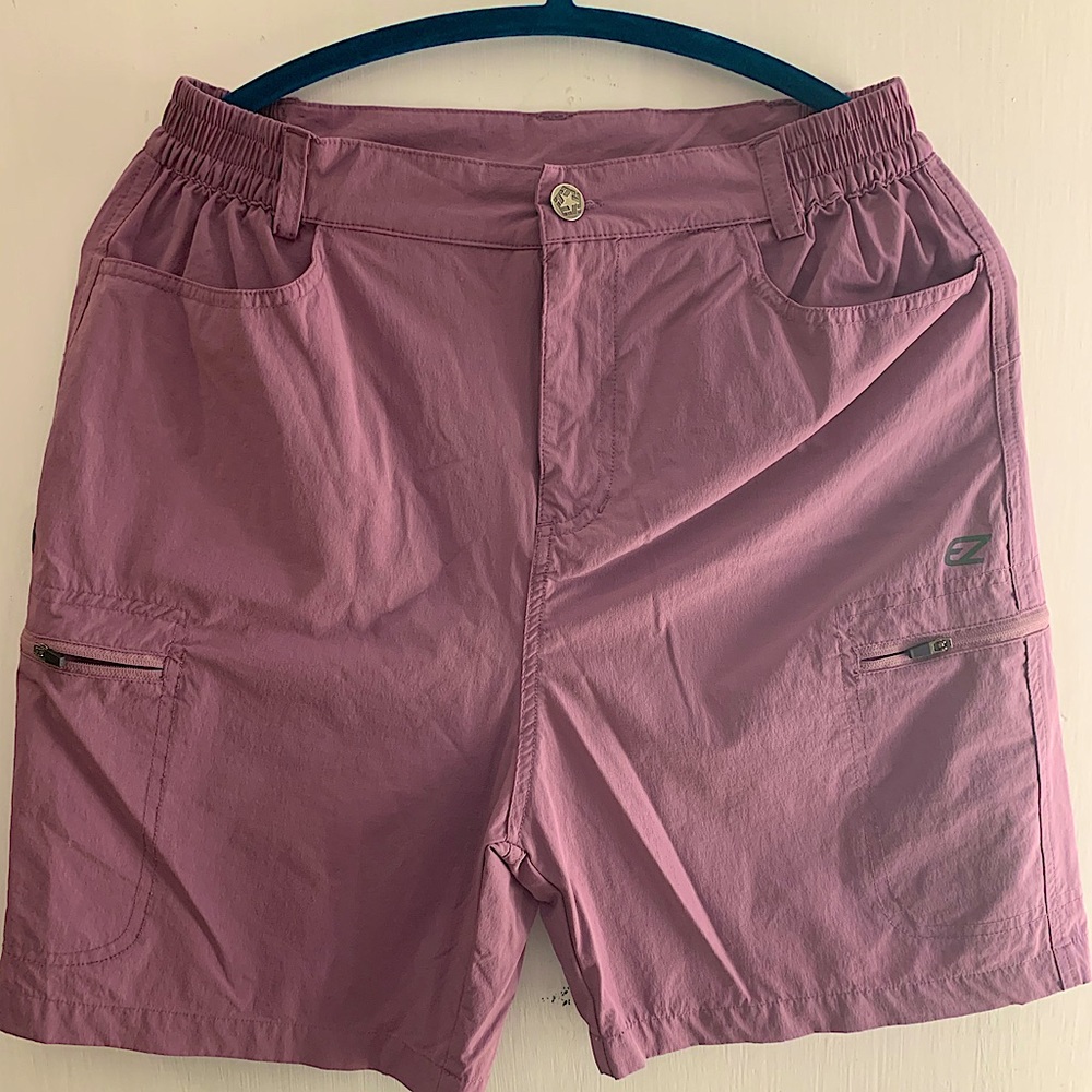 Purple-pink quick dry shorts. Woman’s size medium.